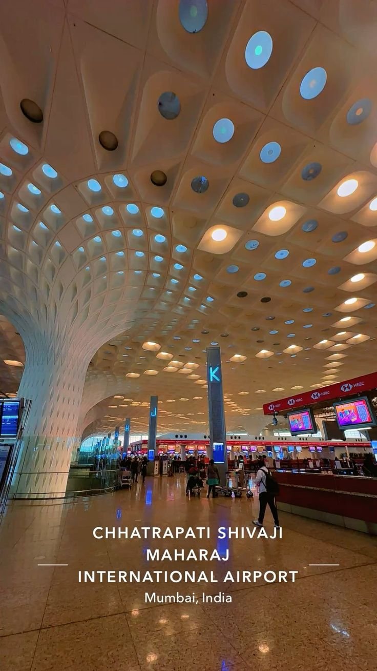 Mumbai Airport terminal with premium white cab for private airport transfer to Nashik